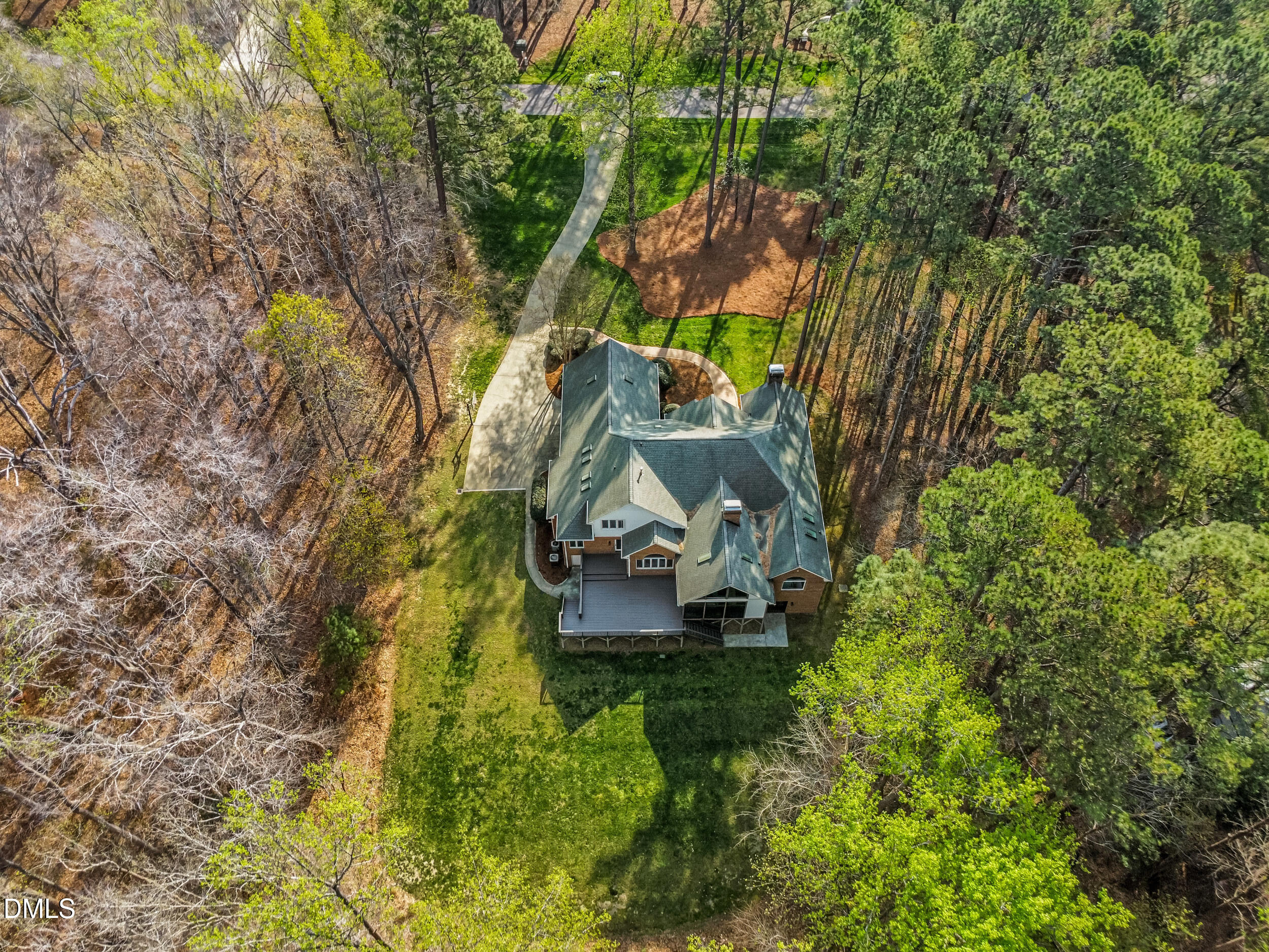 9933 Koupela Drive Raleigh, NC 27614 - Photo 57 of 59 a aerial view of a house with swimming pool and large trees