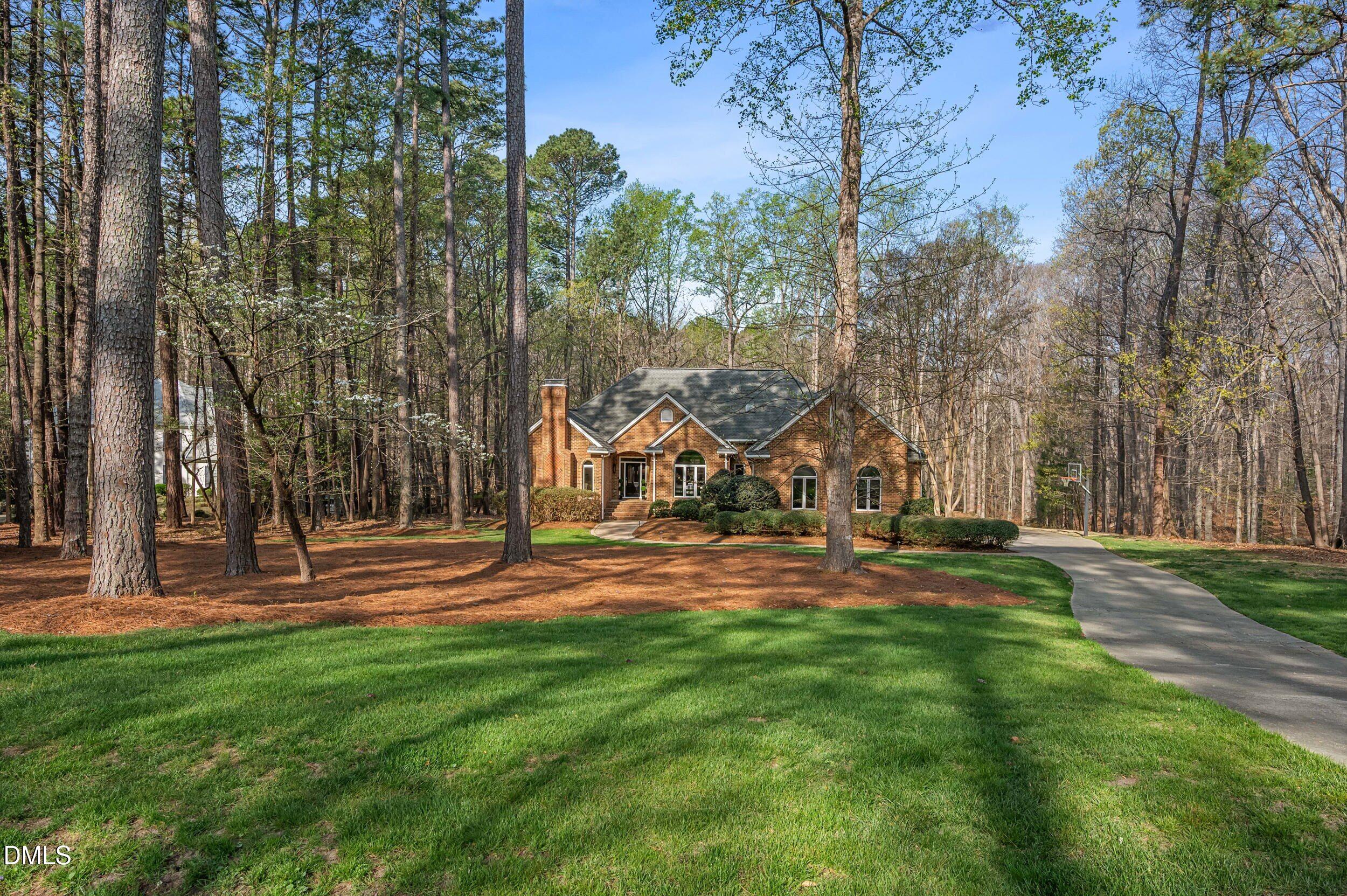 9933 Koupela Drive Raleigh, NC 27614 - Photo 6 of 59 a view of a playground with basketball court