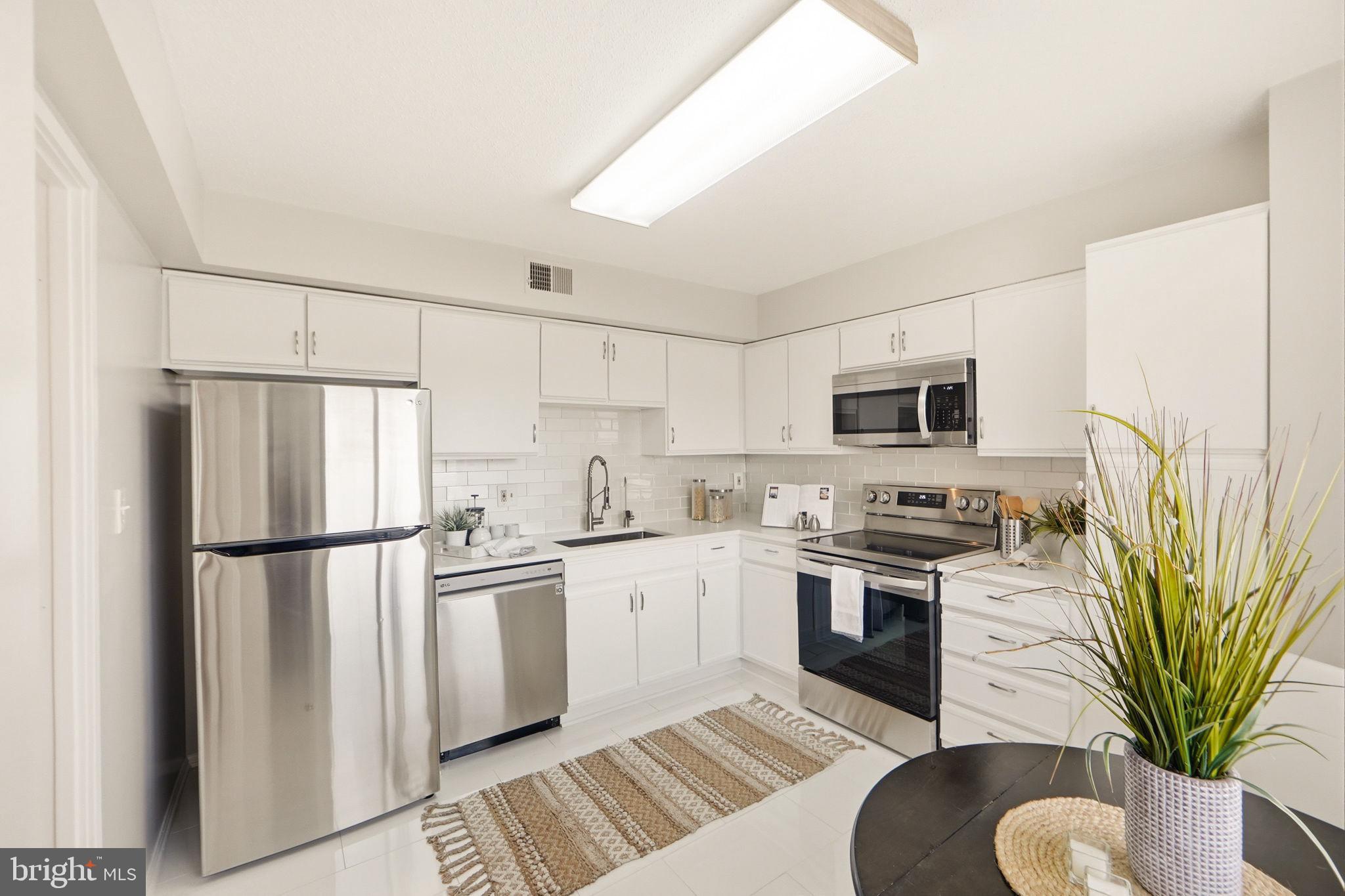 3330 North Leisure World Boulevard, Unit 5627 Silver Spring, MD 20906 - Photo 12 of 35 Kitchen