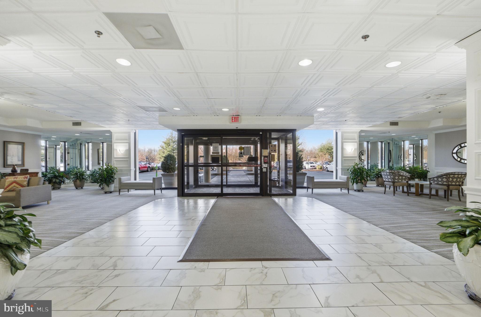 3330 North Leisure World Boulevard, Unit 5627 Silver Spring, MD 20906 - Photo 29 of 35 Fairways South lobby entrance