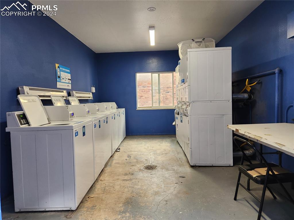 2902 Airport Road, Unit 215 Colorado Springs, CO 80910 - Photo 15 of 17 a utility room with dryer and washer