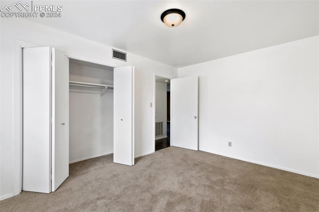 2902 Airport Road, Unit 215 Colorado Springs, CO 80910 - Photo 9 of 17 a view of an empty room