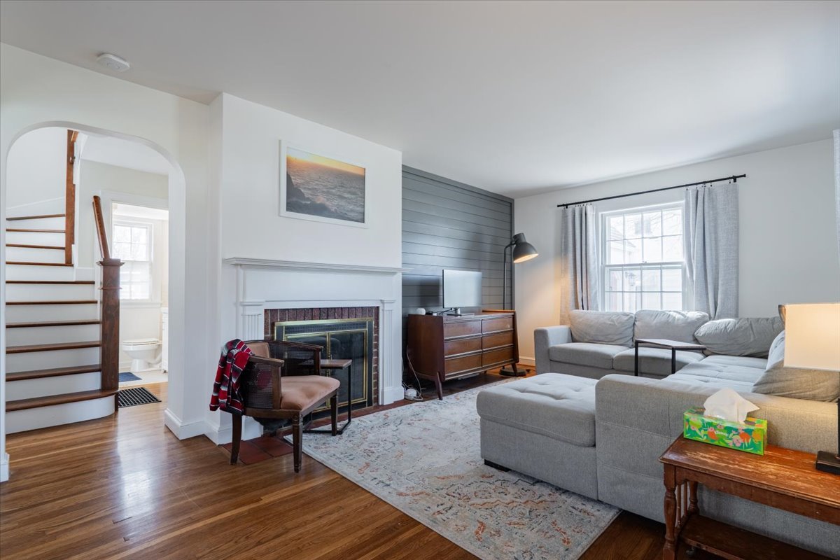 413 Grant Street Normal, IL 61761 - Photo 5 of 40 a living room with furniture and a fireplace