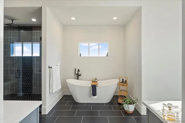 a very nice looking dining room with a large window