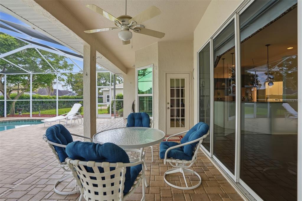 14228 Presteign Lane Spring Hill, FL 34609 - Photo 70 of 89 a living room with furniture and a large window