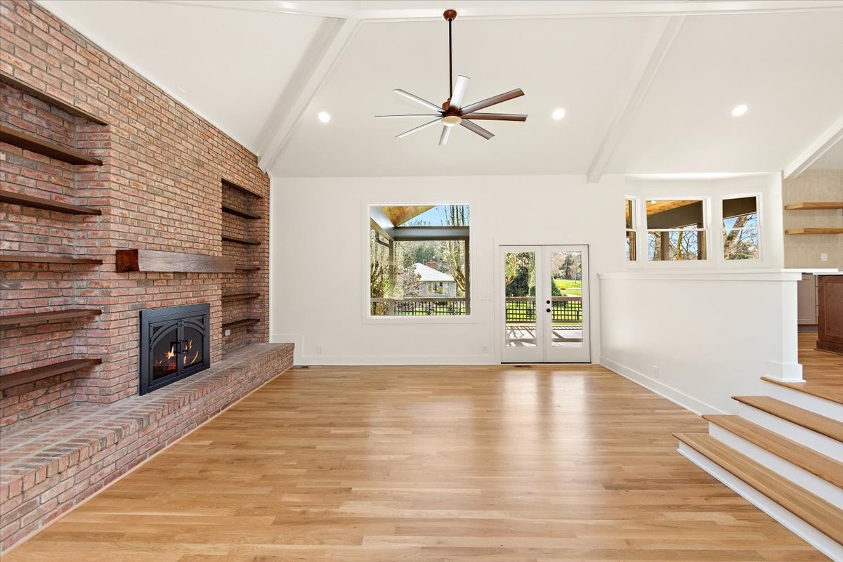 1409 Sneed Road West Franklin, TN 37069 - Photo 17 of 63 a view of an empty room with window and wooden floor