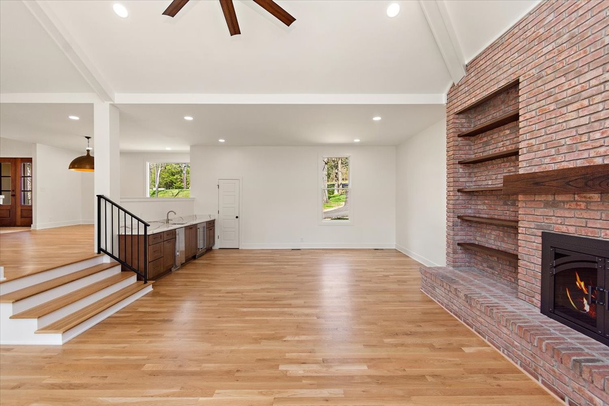 1409 Sneed Road West Franklin, TN 37069 - Photo 20 of 63 a living room with furniture and a fireplace