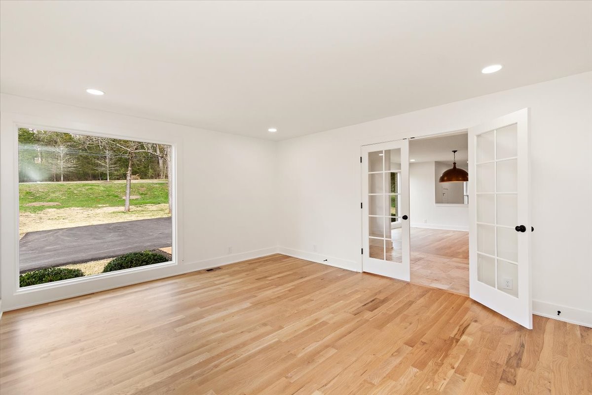 1409 Sneed Road West Franklin, TN 37069 - Photo 26 of 63 a bedroom with a bed and a large window