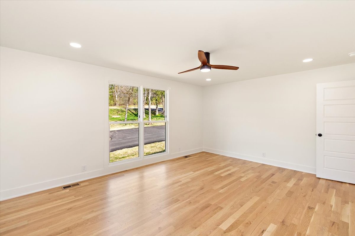 1409 Sneed Road West Franklin, TN 37069 - Photo 30 of 63 a view of an empty room with a window