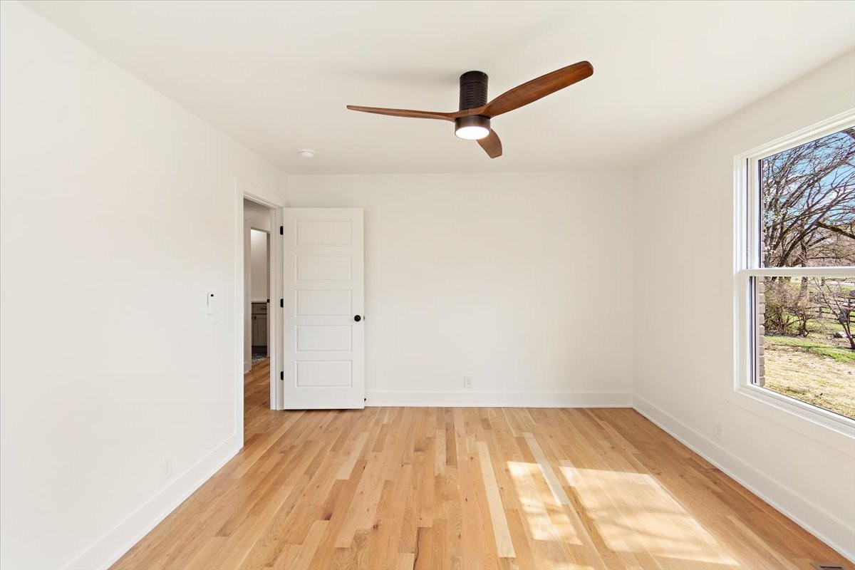 1409 Sneed Road West Franklin, TN 37069 - Photo 37 of 63 a view of a room with a wooden floor