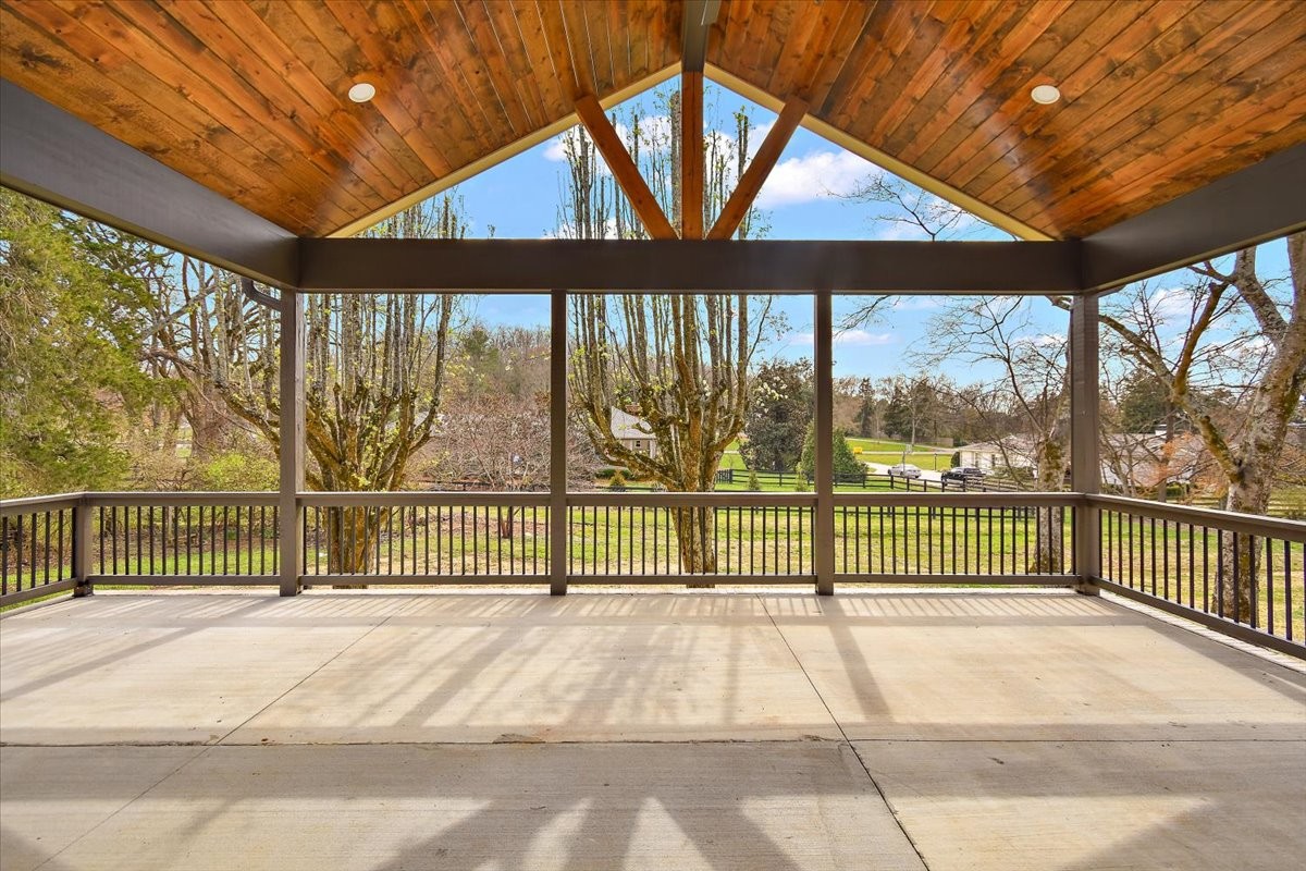 1409 Sneed Road West Franklin, TN 37069 - Photo 49 of 63 a view of a brick house with a large window
