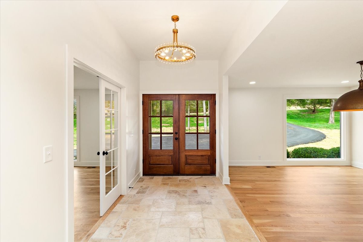 1409 Sneed Road West Franklin, TN 37069 - Photo 5 of 63 a view of an entryway with wooden floor