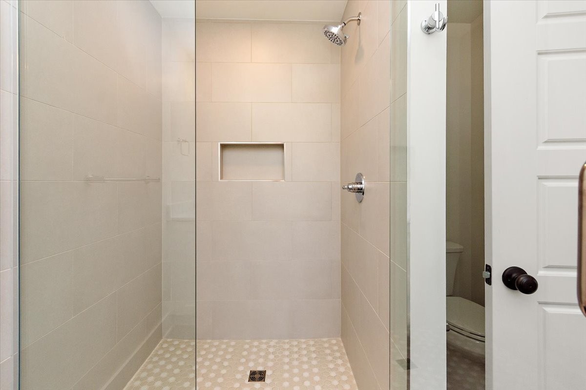 1409 Sneed Road West Franklin, TN 37069 - Photo 57 of 63 a bathroom with a shower