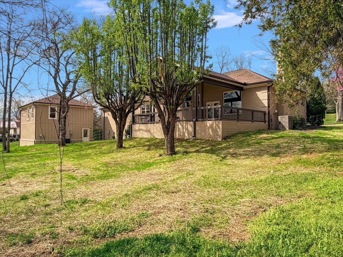 1409 Sneed Road West Franklin, TN 37069 - Photo 62 of 63 a view of a house with a yard