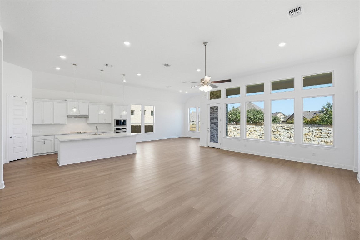 1208 Terrace View Drive Georgetown, TX 78628 - Photo 6 of 15 a view of kitchen with kitchen island and stainless steel appliances