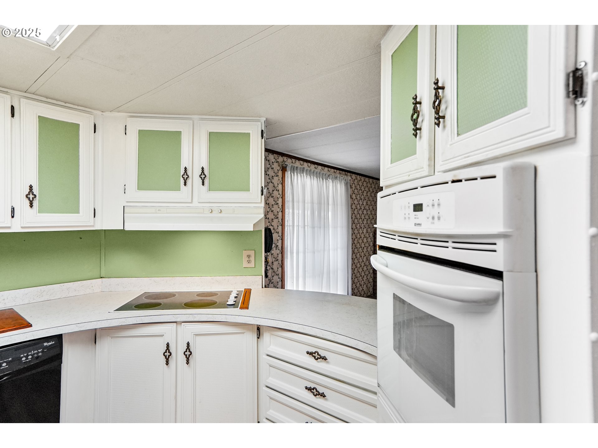 1055 Lockhaven Drive North Keizer, OR 97303 - Photo 12 of 30 a kitchen with a sink cabinets and stainless steel appliances