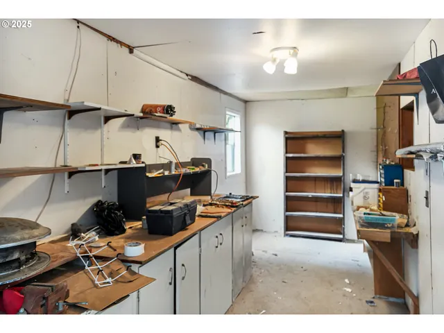 a kitchen view of a stove and a refrigerator