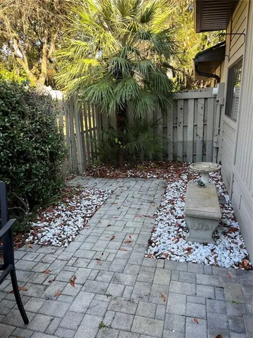 a view of a backyard of the house