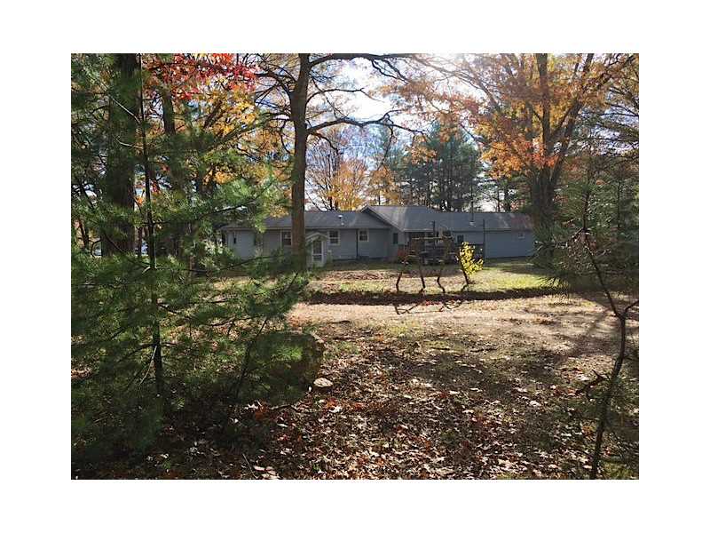 Exterior Back. 1.4 acre lot