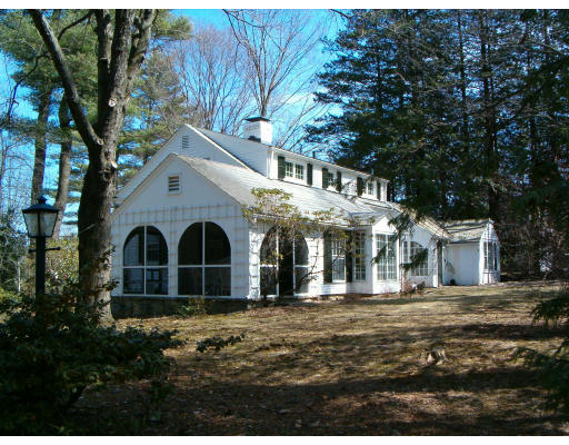 160 Triangle Street Amherst, MA 01002 - Photo 1 of 1 a front view of a house with a yard