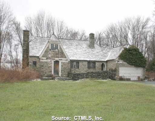 a front view of house with yard