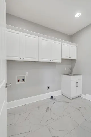 a view of entryway with stairs and wooden floor