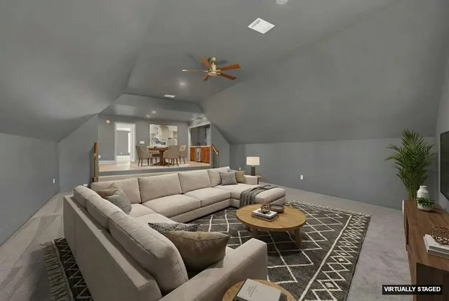 a large room with a large window and cabinets