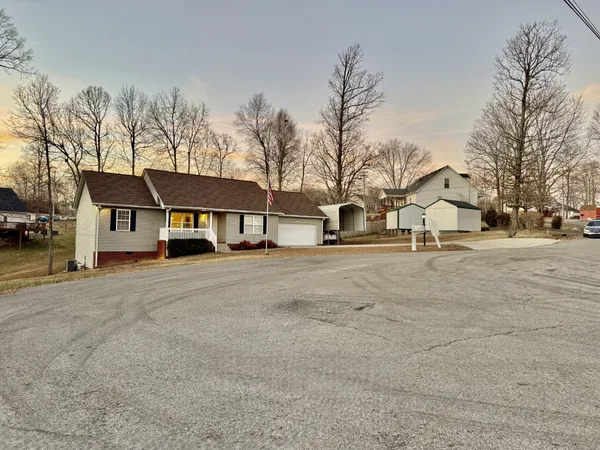 a view of house with a street
