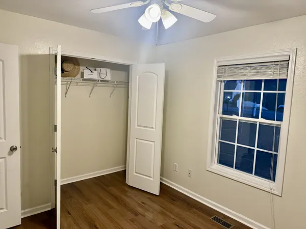 a view of a room with racks on the wall