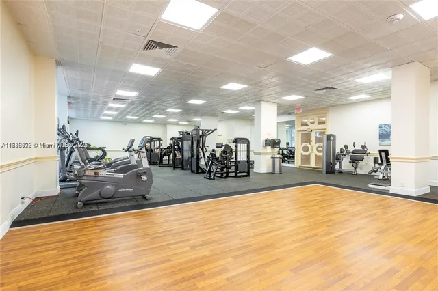 a view of a lobby with gym equipment