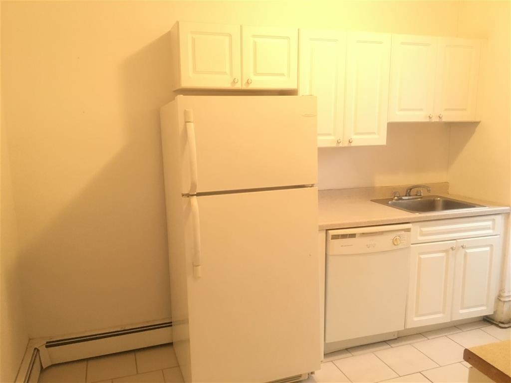 217 10th Street, Unit 2A Hoboken, NJ 07030 - Photo 2 of 4 a utility room with dryer and washer