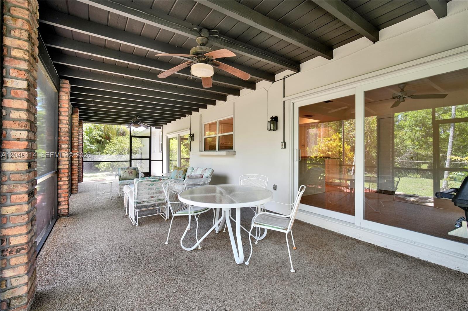 10435 Southwest 96th Street Miami, FL 33176 - Photo 30 of 44 Spacious 39' x 12' covered patio across the back of the house