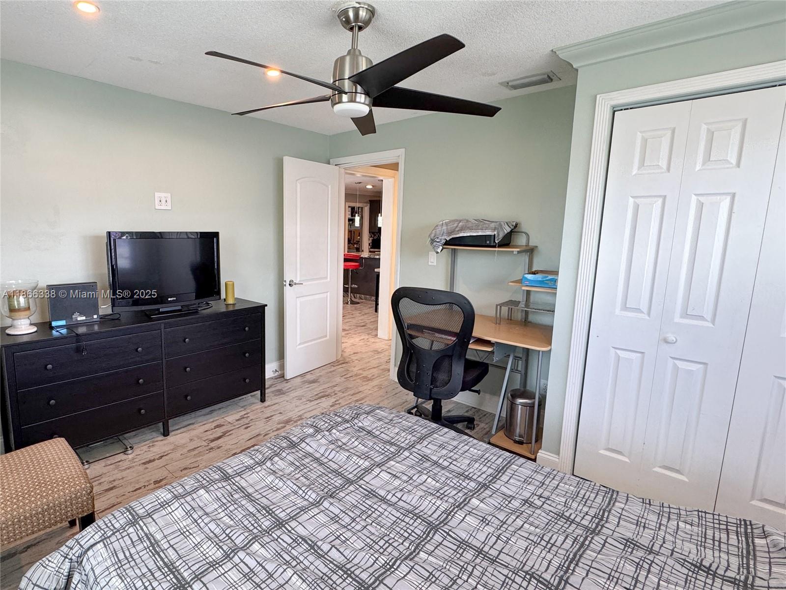 161 Northwest 27th Court Pompano Beach, FL 33064 - Photo 22 of 33 a view of a workspace with furniture and a window