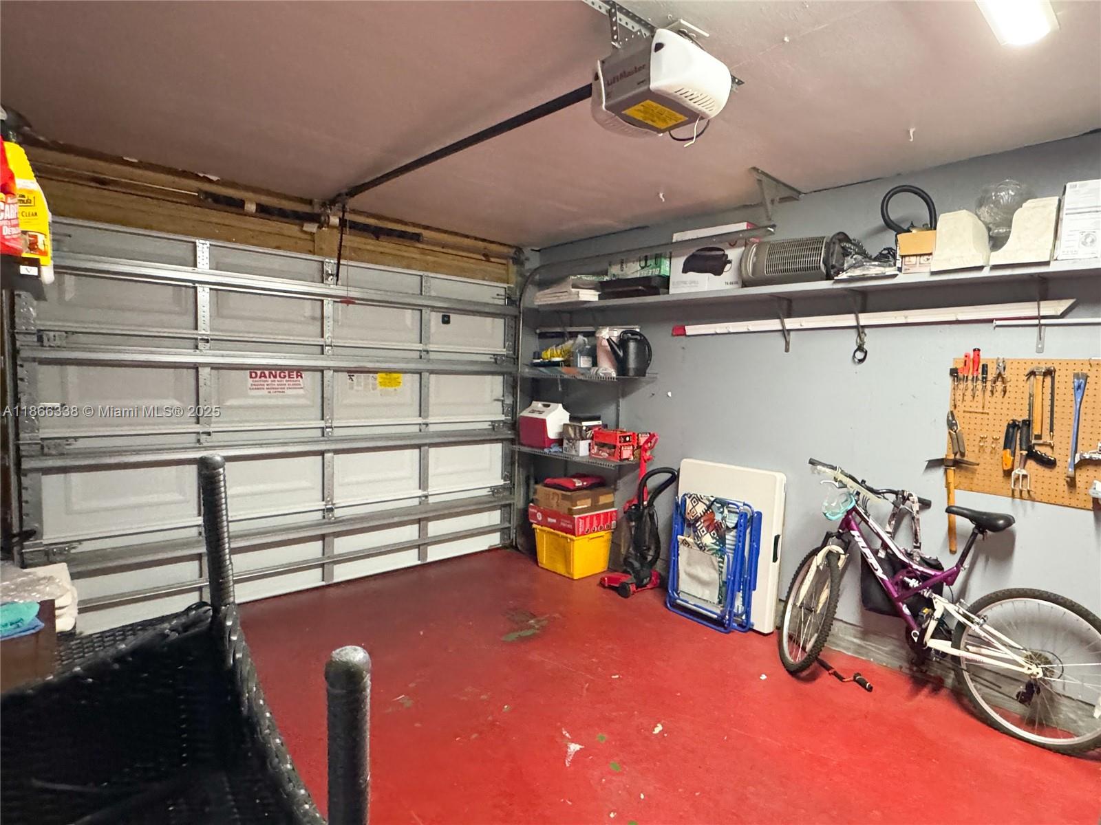 161 Northwest 27th Court Pompano Beach, FL 33064 - Photo 23 of 33 a view of storage and utility room