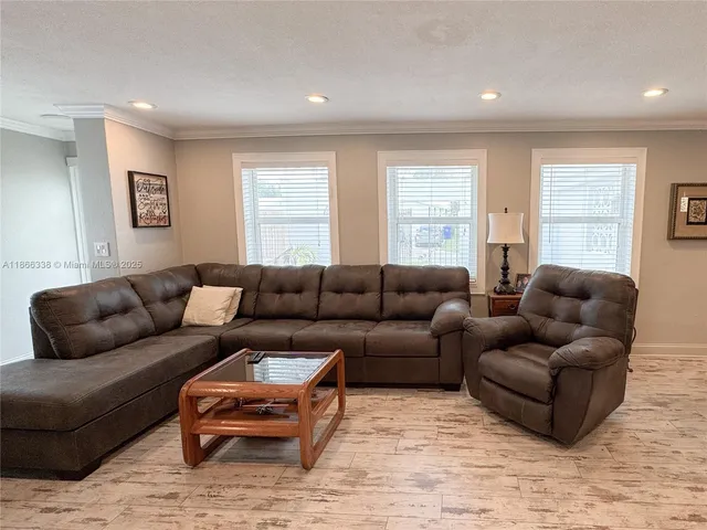 a bedroom with a bed and dresser