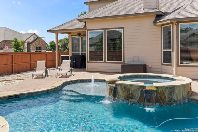 a view of a house with backyard porch and patio