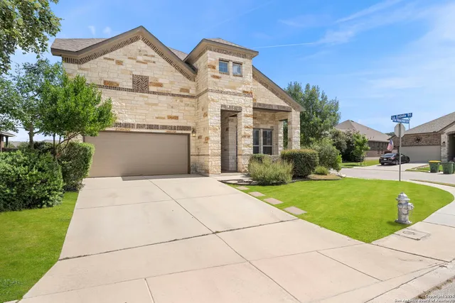 a front view of house with garden
