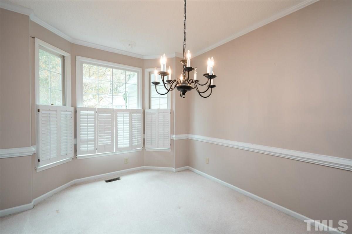 5617 Barham Court Raleigh, NC 27613 - Photo 11 of 30 a view of an empty room with a window
