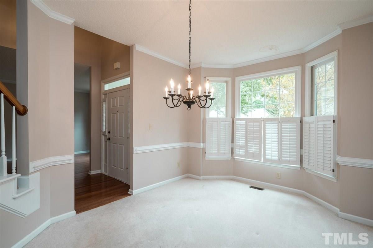 5617 Barham Court Raleigh, NC 27613 - Photo 12 of 30 a view of an empty room with a window