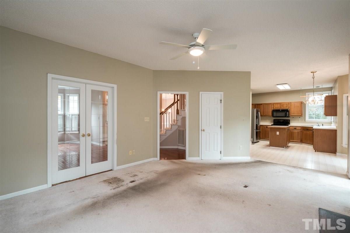 5617 Barham Court Raleigh, NC 27613 - Photo 15 of 30 a view of a livingroom with a kitchen