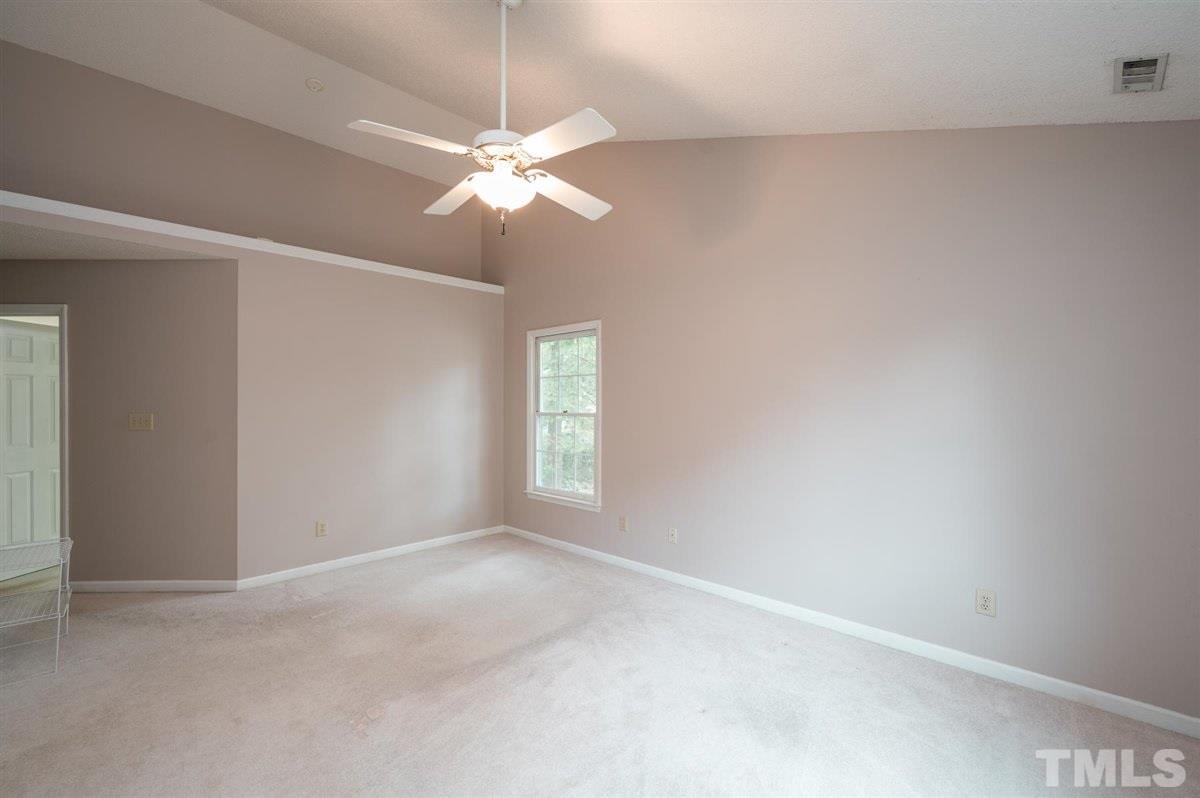 5617 Barham Court Raleigh, NC 27613 - Photo 23 of 30 a view of an empty room with a window
