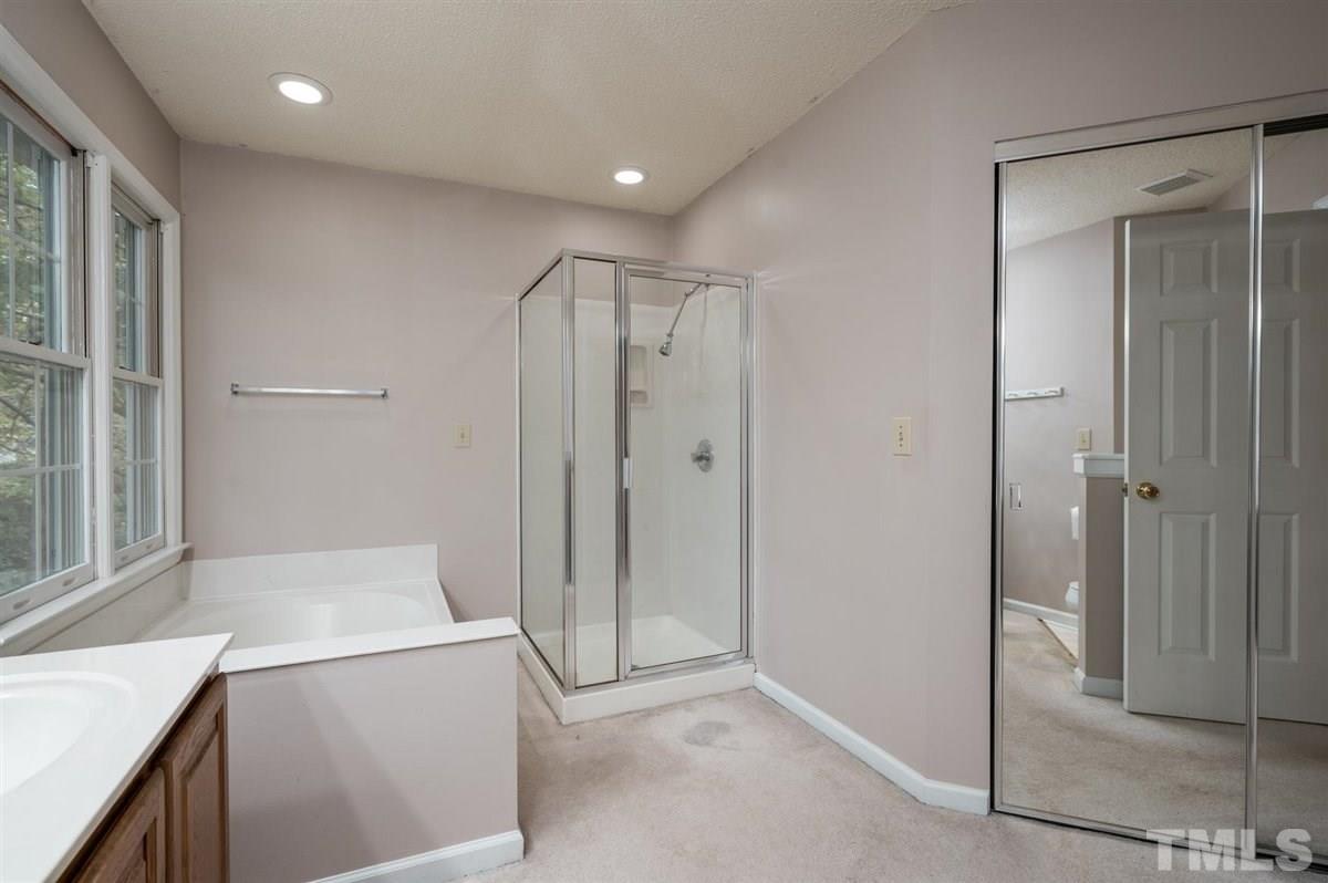 5617 Barham Court Raleigh, NC 27613 - Photo 25 of 30 a view of an empty room and bathroom