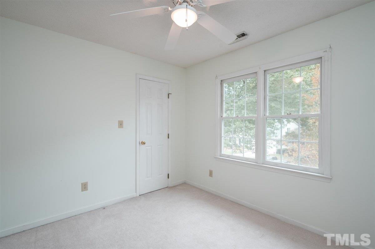 5617 Barham Court Raleigh, NC 27613 - Photo 26 of 30 a view of an empty room with a window