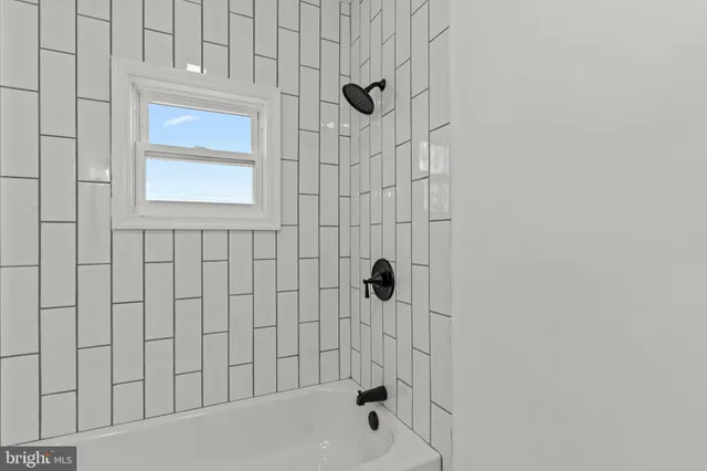 a bathroom with a bathtub