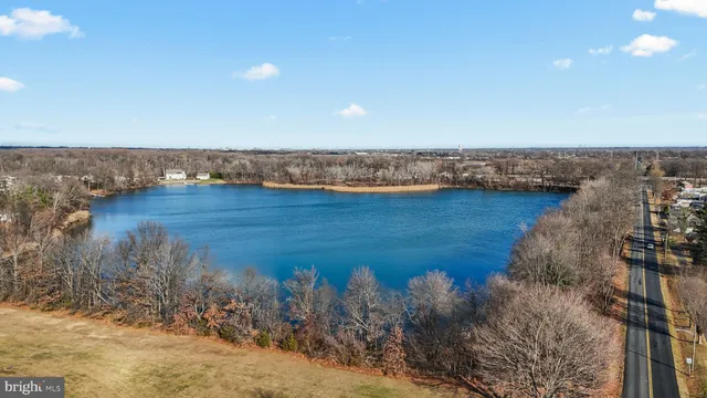 a view of a lake with a city