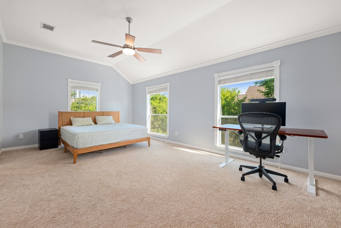 2937 Jackson Street Houston, TX 77004 - Photo 19 of 28 a bedroom with a bed and a window