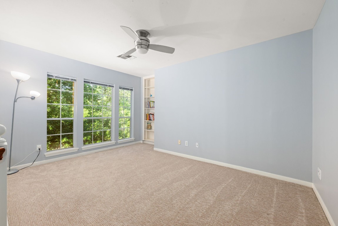 2937 Jackson Street Houston, TX 77004 - Photo 22 of 28 a view of a livingroom with a ceiling fan and window