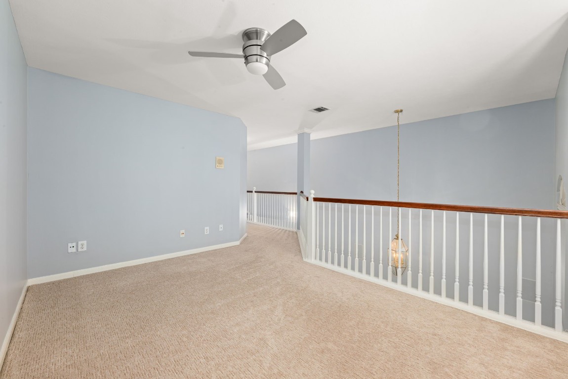 2937 Jackson Street Houston, TX 77004 - Photo 23 of 28 a view of a hallway with a ceiling fan