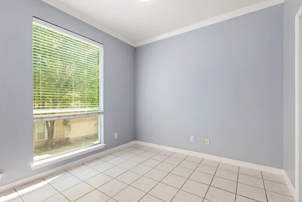 a view of an empty room with window