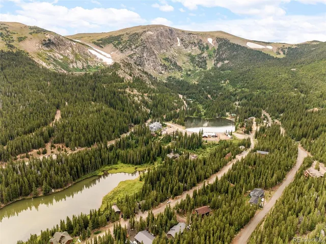 a view of a mountain from a lake